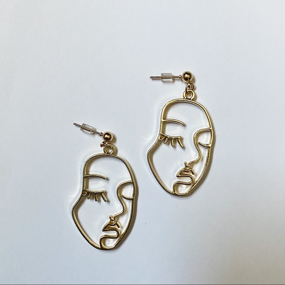 Gold Face Dangle Earrings